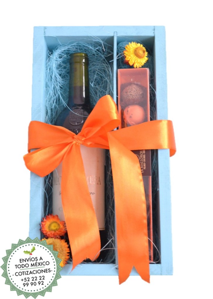 Arreglo de regalo con vino tinto y trufas de chocolate