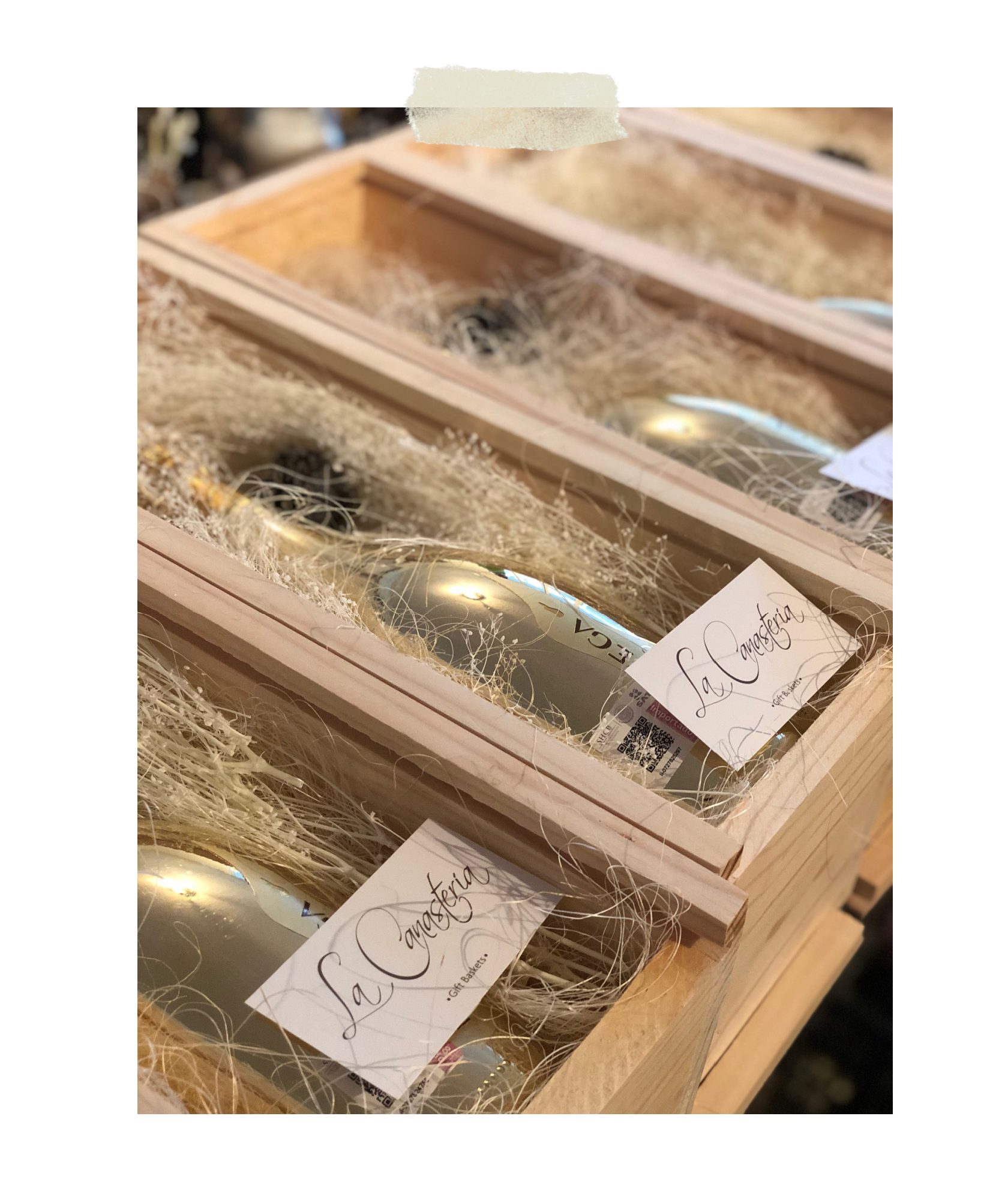 Elegantes arreglos navideños de botella bottega para regalos a clientes 